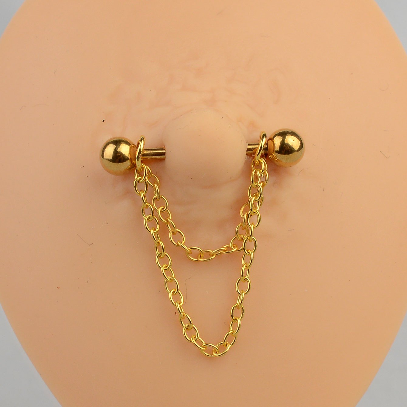 ステンレス鋼のバーベルニップルピアス,女性用,コーン型ボール - Body Jewelry Nipple Chain のレビューと価格